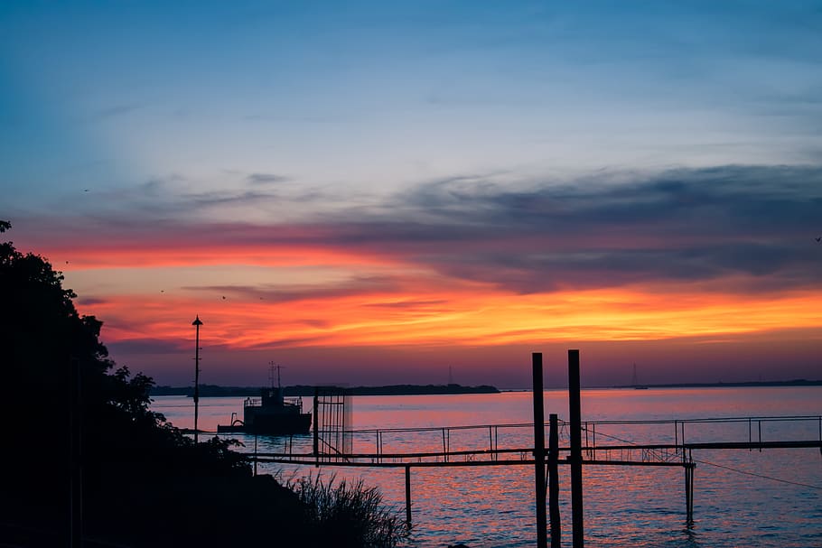 sunset, river, boats, water, sky, cloud - sky, beauty in nature HD wallpaper