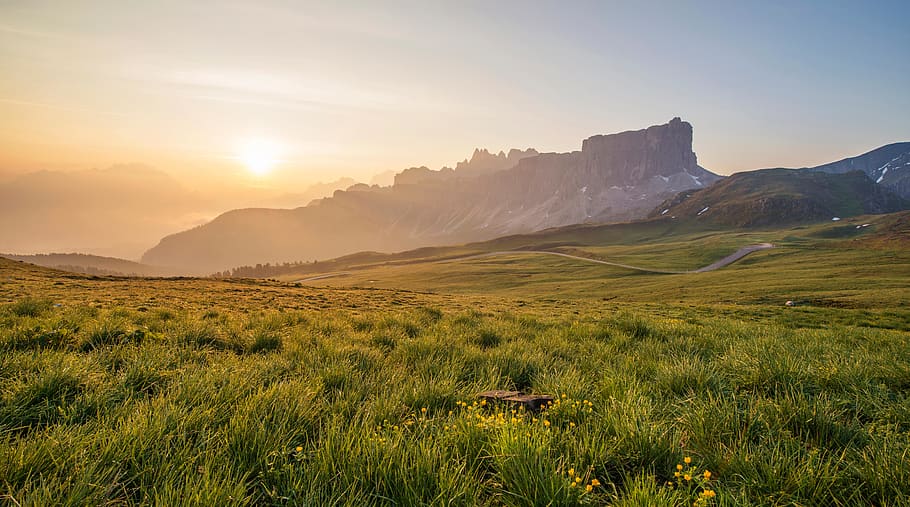 sunset, landscape, nature, grass, field, mountains, hills, valleys HD wallpaper