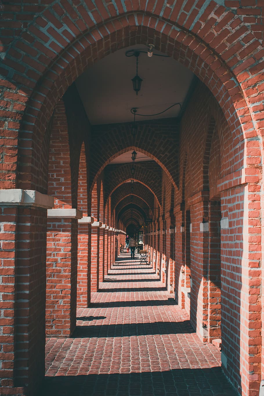 Woman Walking on Concrete Hallway, arch, architectural design HD wallpaper