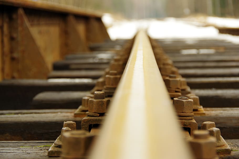 rails, screw, flyover, rust, railroad, selective focus, no people HD wallpaper