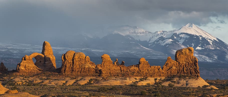 Valley Near Snowy Mountain during Daytime, arches national park, HD wallpaper