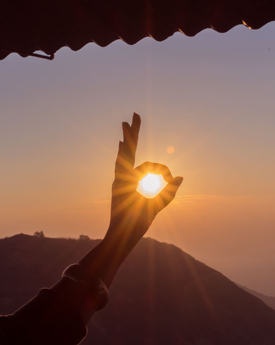Photography of Hand During Sunset, backlit, bright, clear sky HD wallpaper