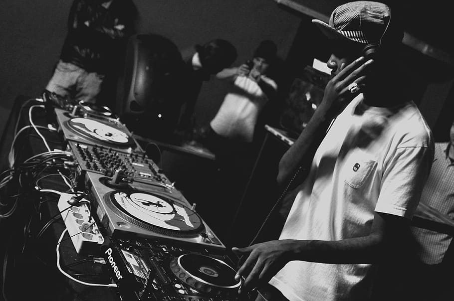 grayscale photo of man playing DJ mixing console, music, arts culture and entertainment, HD wallpaper