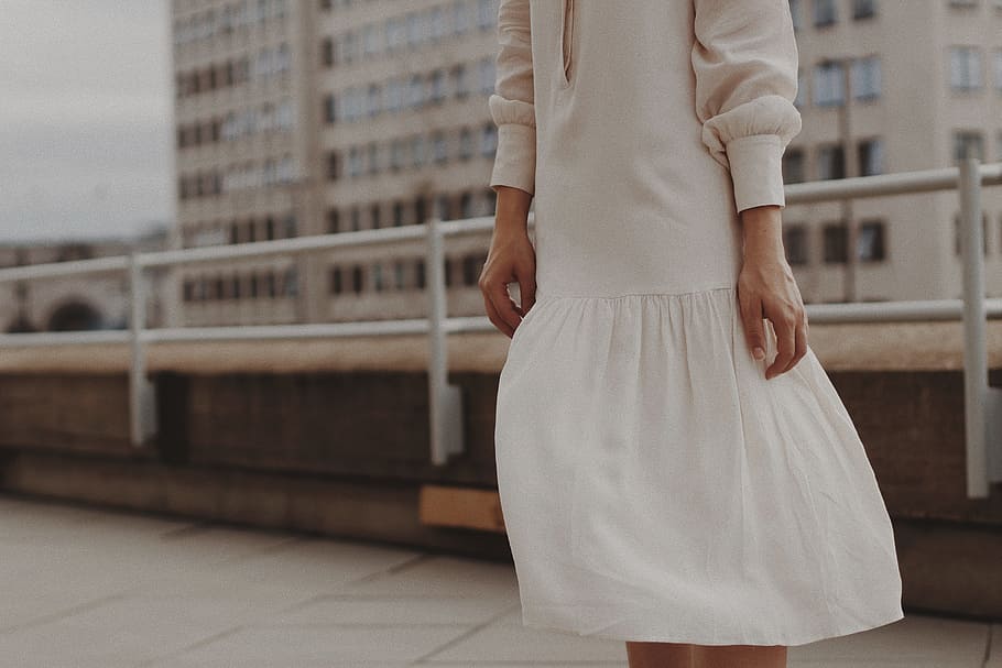 woman wearing gray long-sleeved dress standing near handrail, HD wallpaper