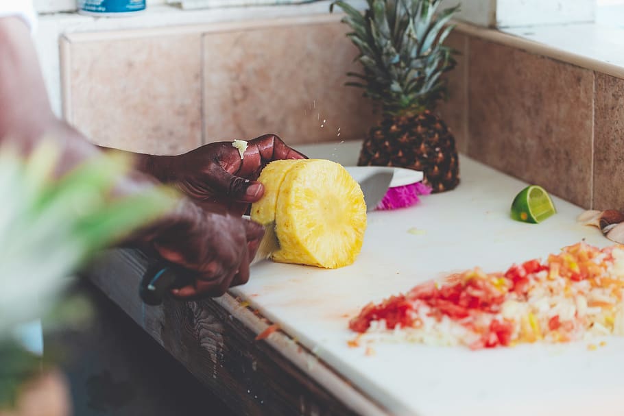 Person Chopping Fruit, bahamian, Bahamian food, black hands, chef, HD wallpaper
