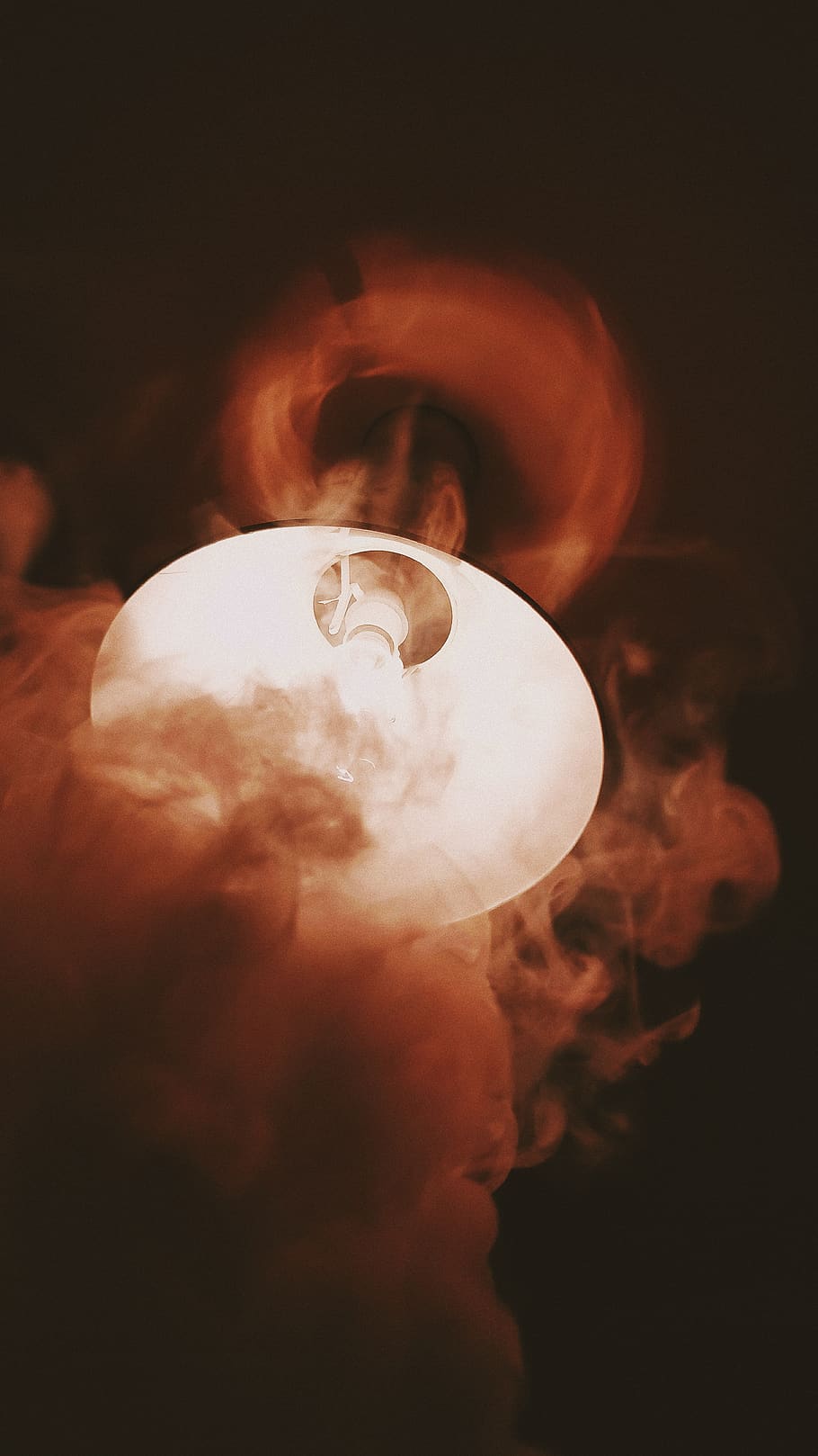 Red smoke surrounding a ceiling light fixture., holding, smoke - physical structure HD wallpaper