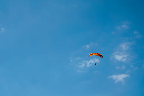 person skydiving, adventure, gliding, leisure activities, paraland resort HD wallpaper