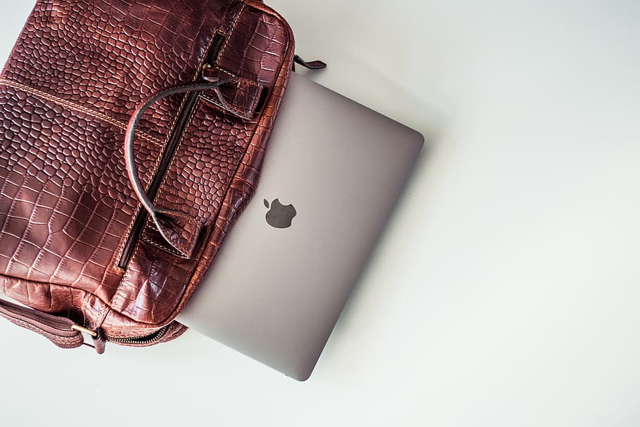 MacBook Pro, leather, bag, no people, fashion, indoors, studio shot HD wallpaper