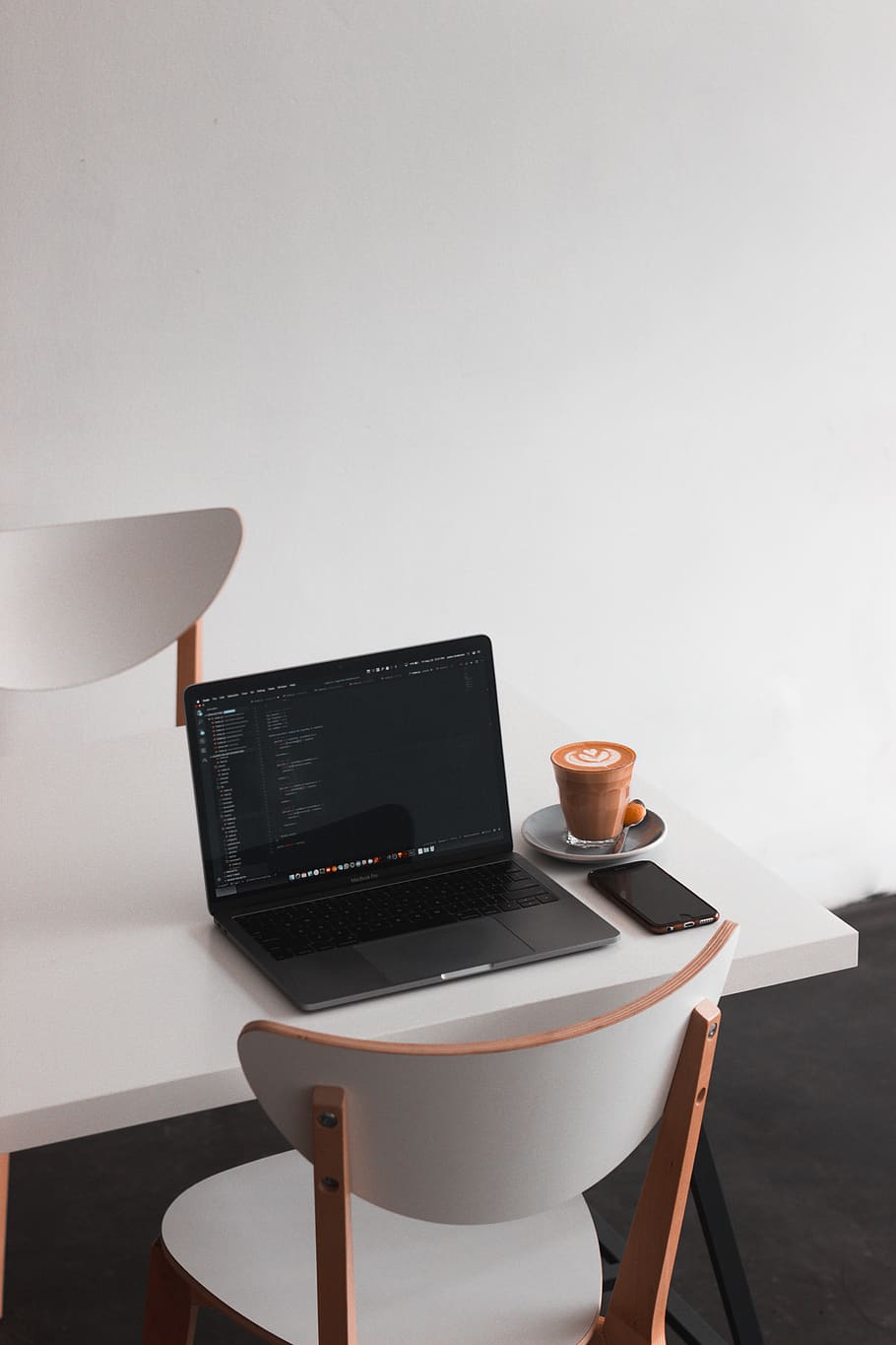 black laptop computer turned on, technology, table, seat, chair HD wallpaper