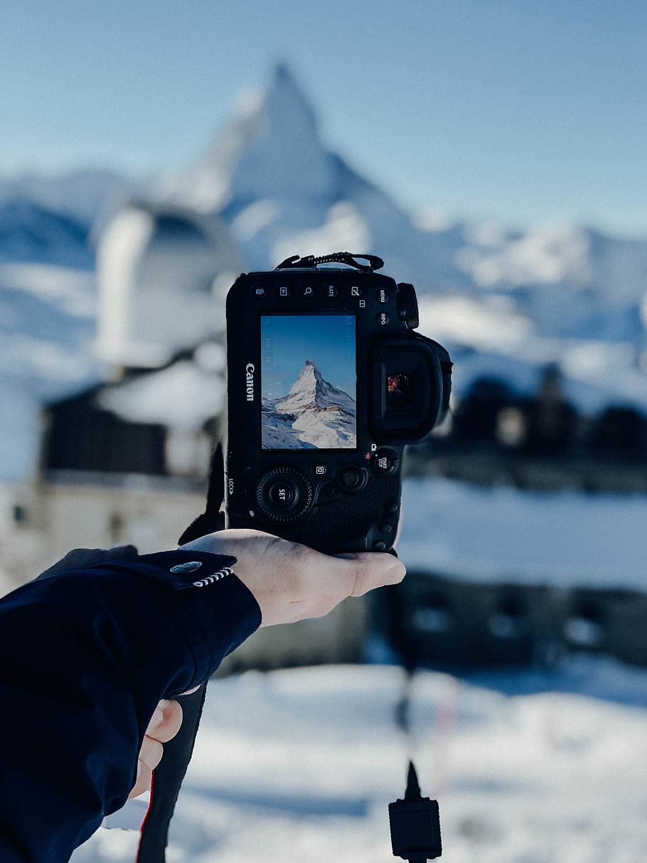 Black Canon Dslr Camera, hands, landscape, macro, mountain, snow HD wallpaper