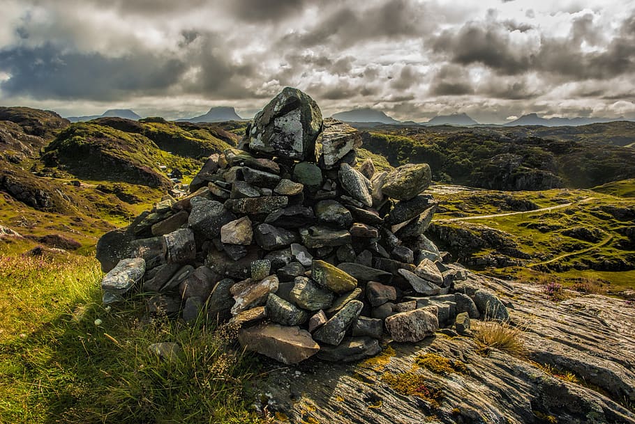 Pile of Rocks, cliff, clouds, cloudy, dark clouds, environment HD wallpaper
