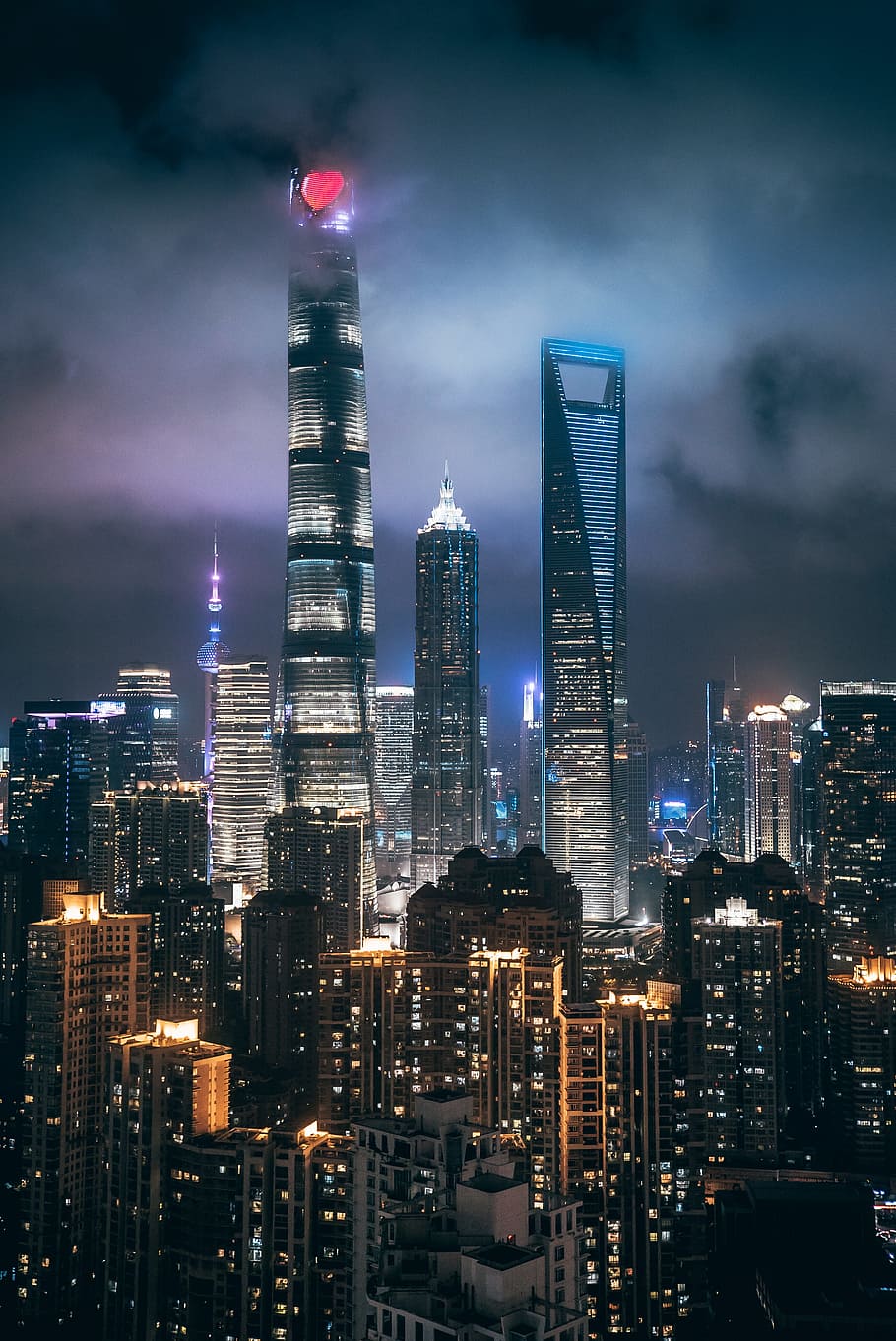 HD wallpaper: black high-rise building, city, light, tower, skyscraper,  glow | Wallpaper Flare