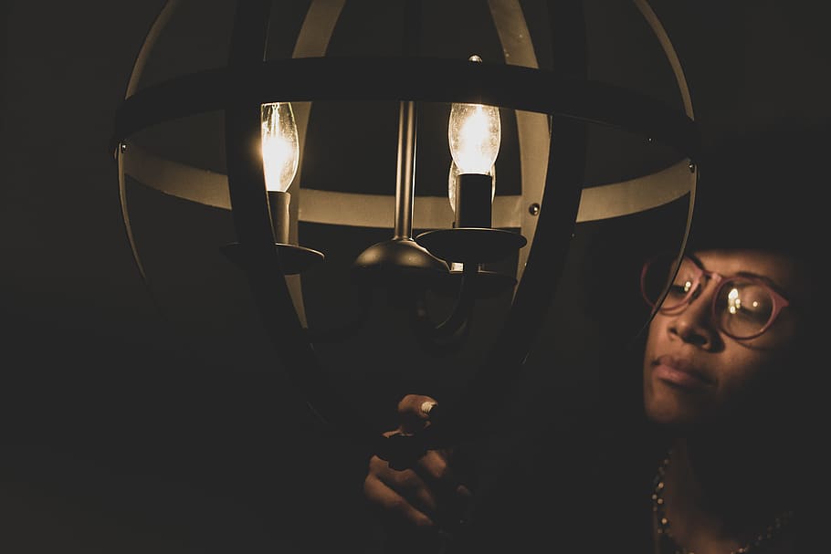 Man Wearing Brown Framed Eyeglasses Turning on a Lamp, bulb, dark HD wallpaper