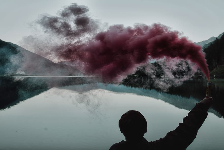 Person Holding Smoke Bomb, daylight, desktop backgrounds, lakeside HD wallpaper