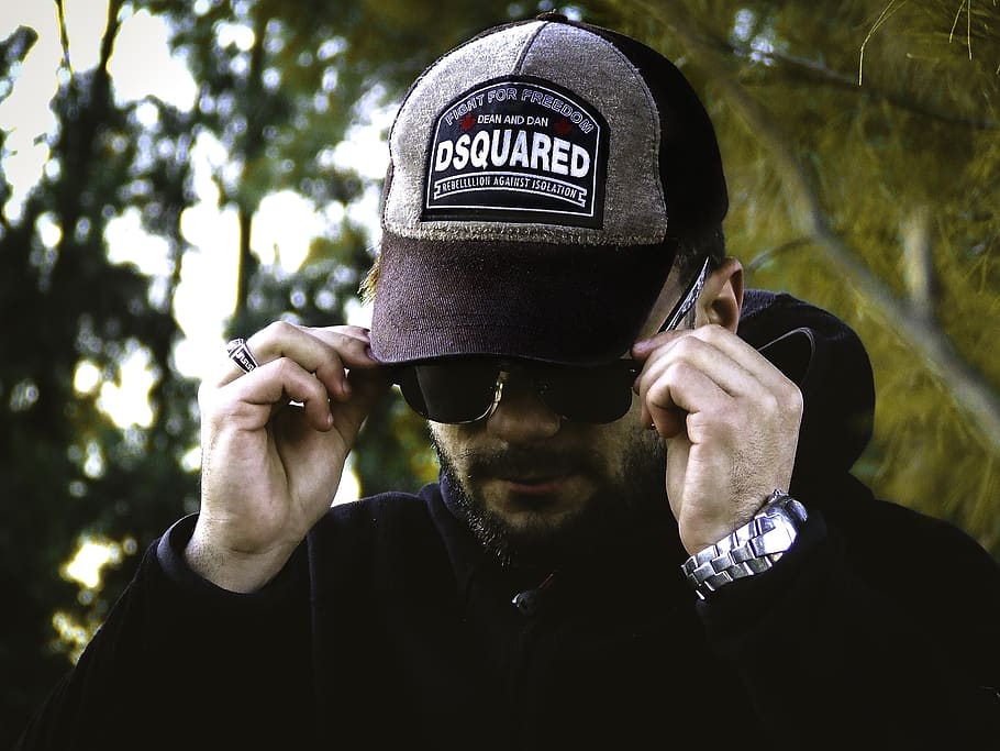 Man In Black Hoodie Wearing Black Sunglasses, cap, eyewear, hands HD wallpaper