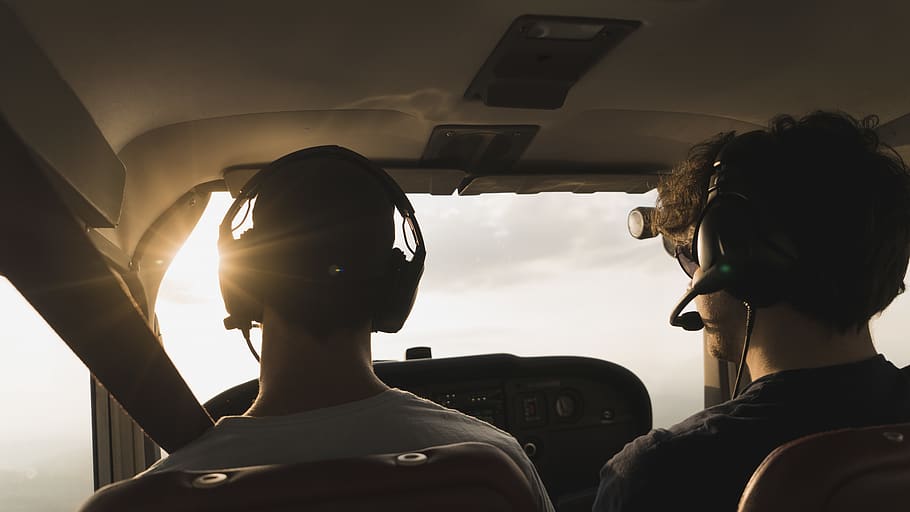 closeup photo of two pilot and co pilot inside plane, headshot, HD wallpaper