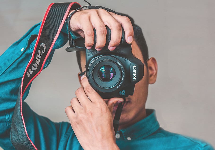 Man Taking Photo Using Black Canon Camera, camera lens, dslr HD wallpaper