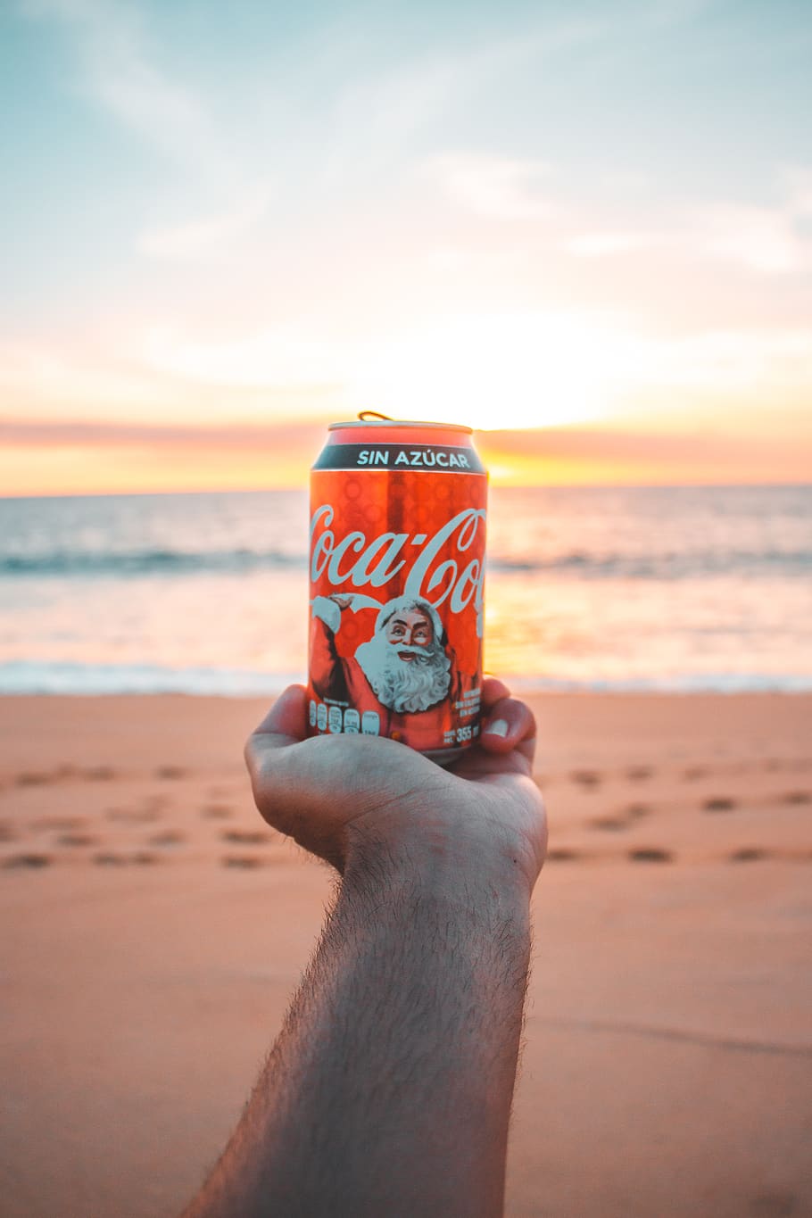 Coca-Cola can fronting sea, human body part, human hand, beach HD wallpaper