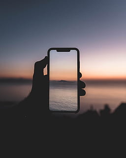 silhouette of person taking picture of body of water, phone, hand HD wallpaper