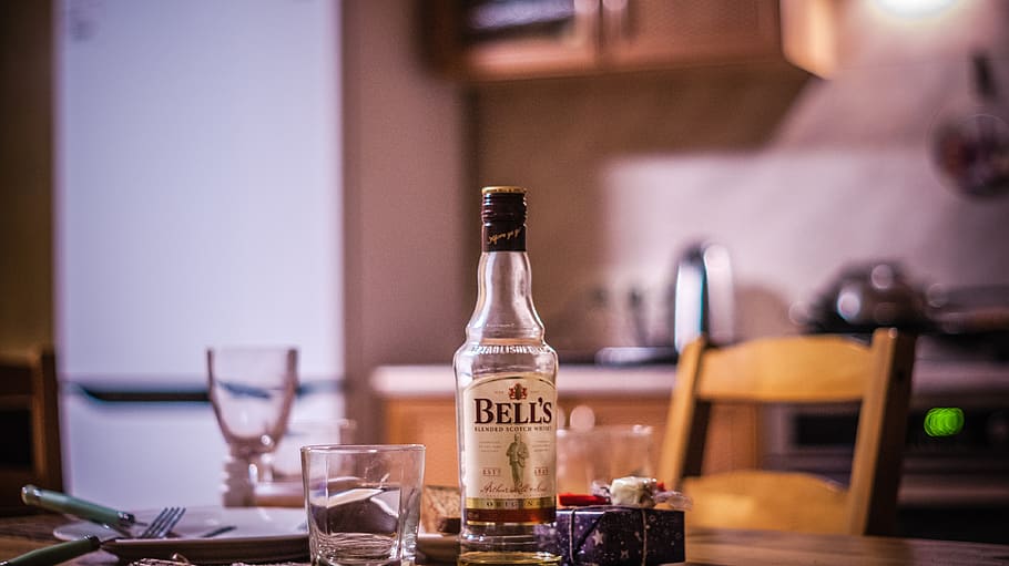 Bell's Whiskey Bottle Beside Grass on Table, alcohol, bar, beverage HD wallpaper