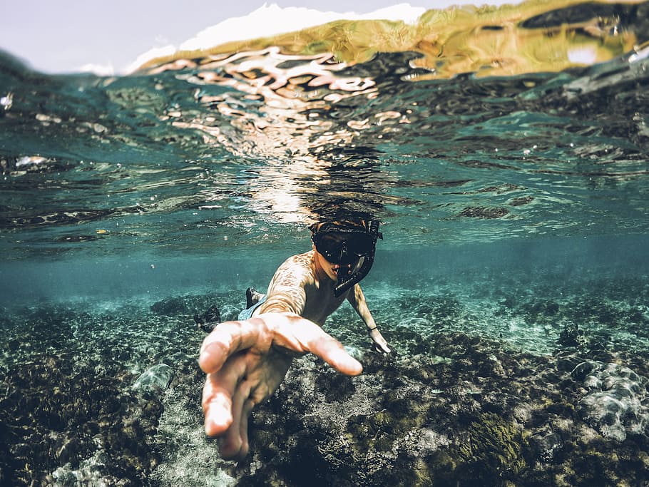 underwater photography of man wearing snorkel lending his hand, HD wallpaper