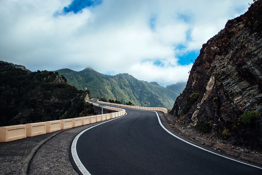 Black Asphalt Road Near Cliff Mountain, clouds, curve, daylight HD wallpaper