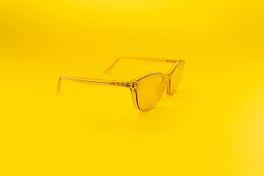 gold framed eyeglasses, studio shot, yellow, colored background HD wallpaper