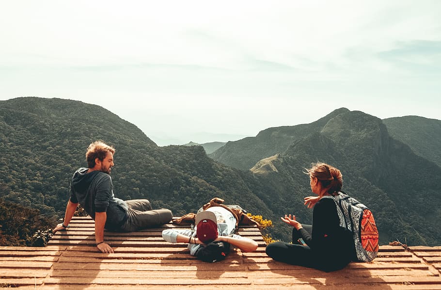 three people overlooking mountains, sitting, mountain range, leisure activity HD wallpaper