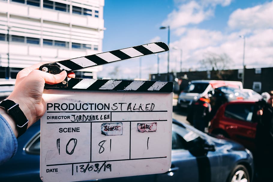 white and black clapper board, hand, human hand, holding, one person HD wallpaper