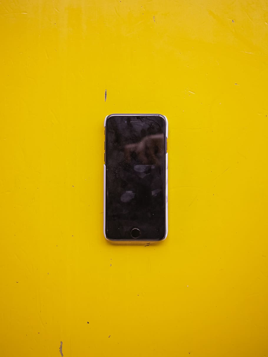 silver iPhone 5 on yellow surface, no people, close-up, backgrounds, HD wallpaper