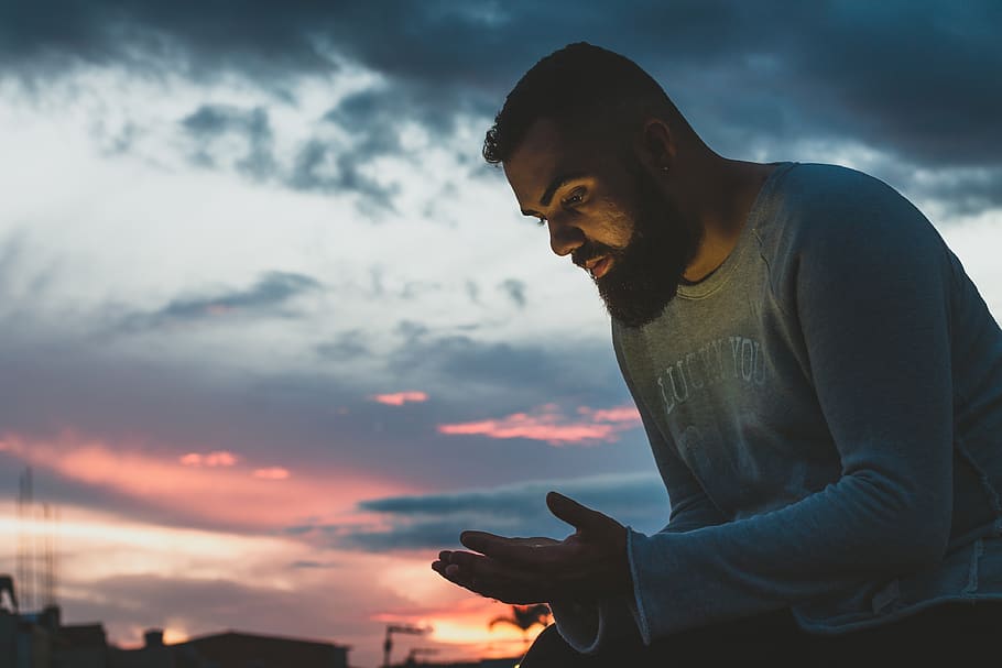 Man Wearing White Sweatshirt, adult, backlit, clouds, dawn, dusk HD wallpaper