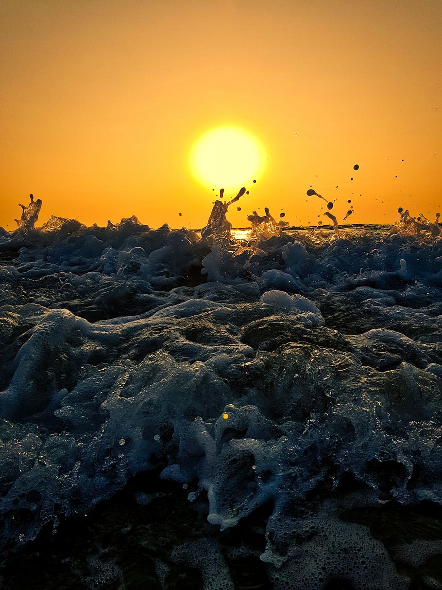 beach, water, sunset, water droplets, splash, orange, nature HD wallpaper