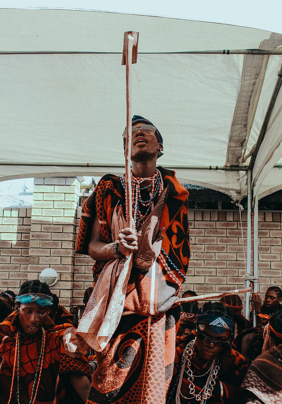 man holding stick, festival, person, crowd, human, skin, south africa HD wallpaper