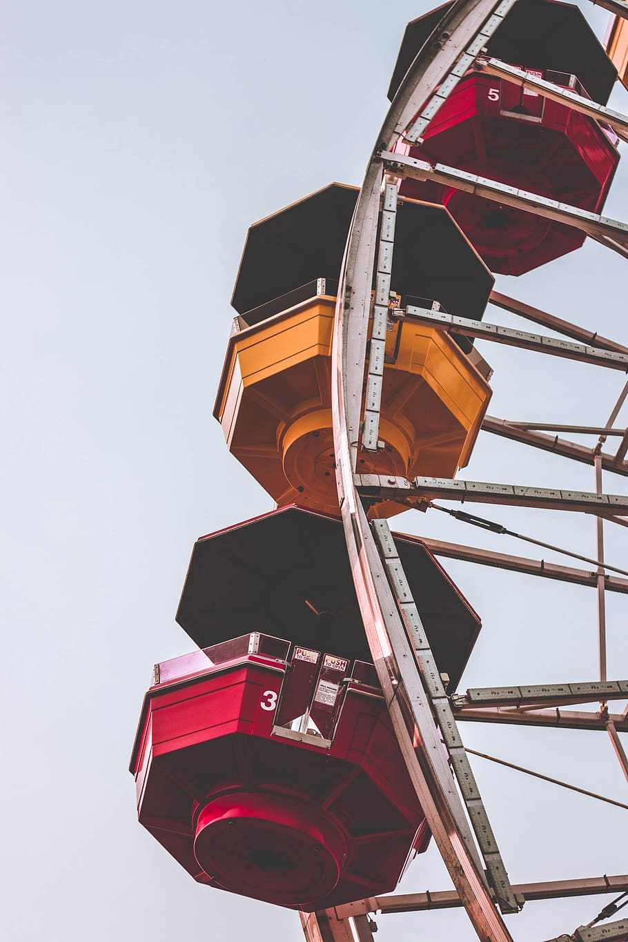 architectural photography of yellow, red, and white ferris wheel HD wallpaper