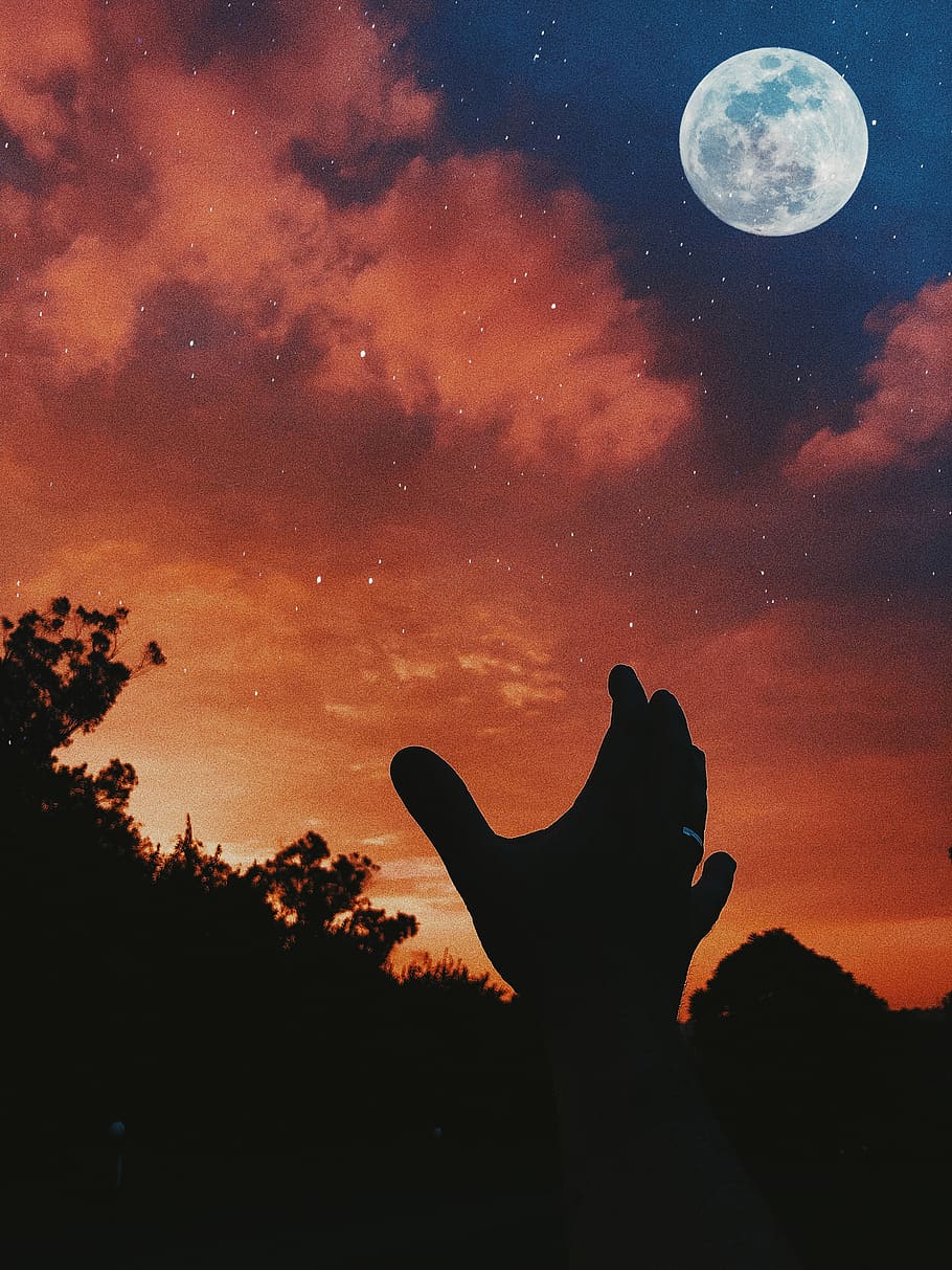 Silhoette of Person Hand, astrology, astronomy, backlit, clouds