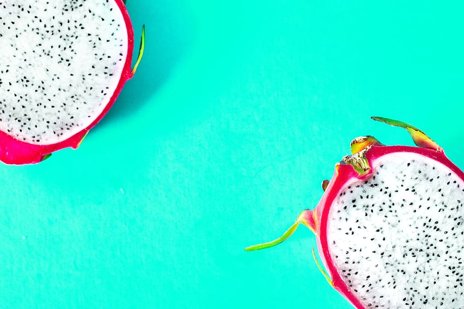 halved red dragonfruit, colored background, food and drink, copy space HD wallpaper