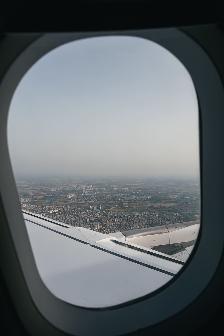 Airliner Window Displaying City, aerial, aeroplane, aircraft HD wallpaper