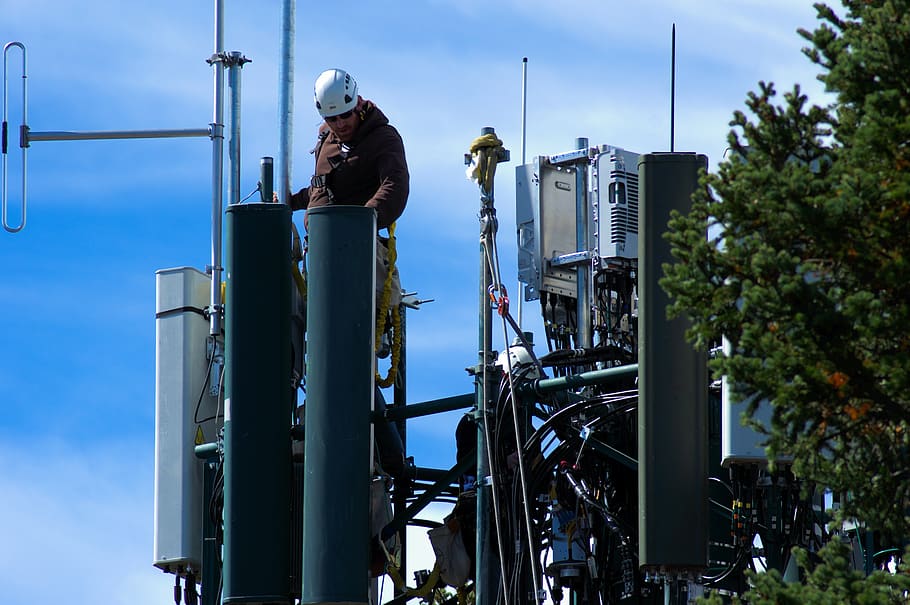 working on cell tower, cellular, workers, communication, phone