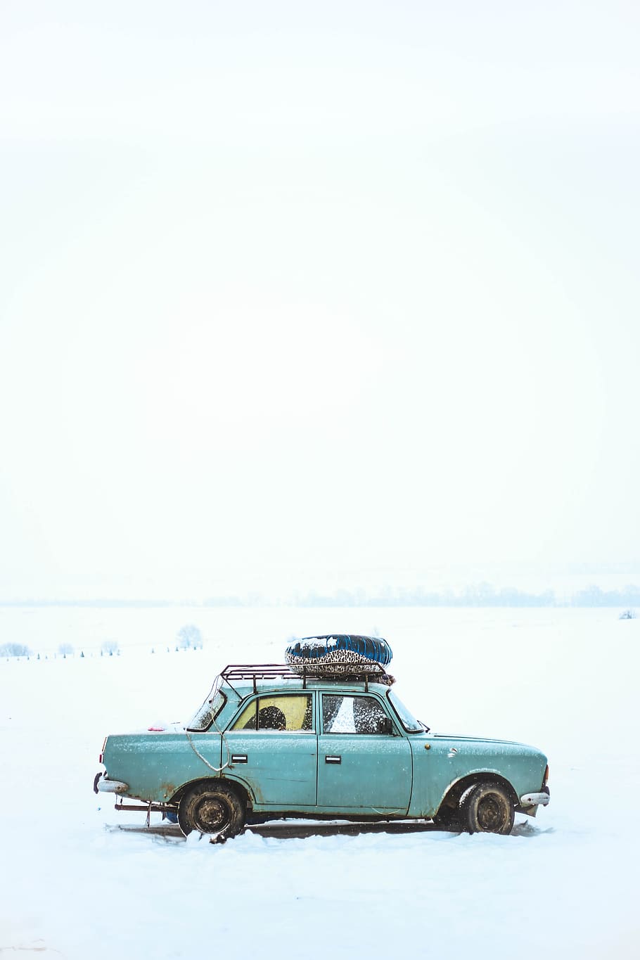Blue Sedan on Snow, automobile, car, cold, daylight, snowy, transportation system HD wallpaper