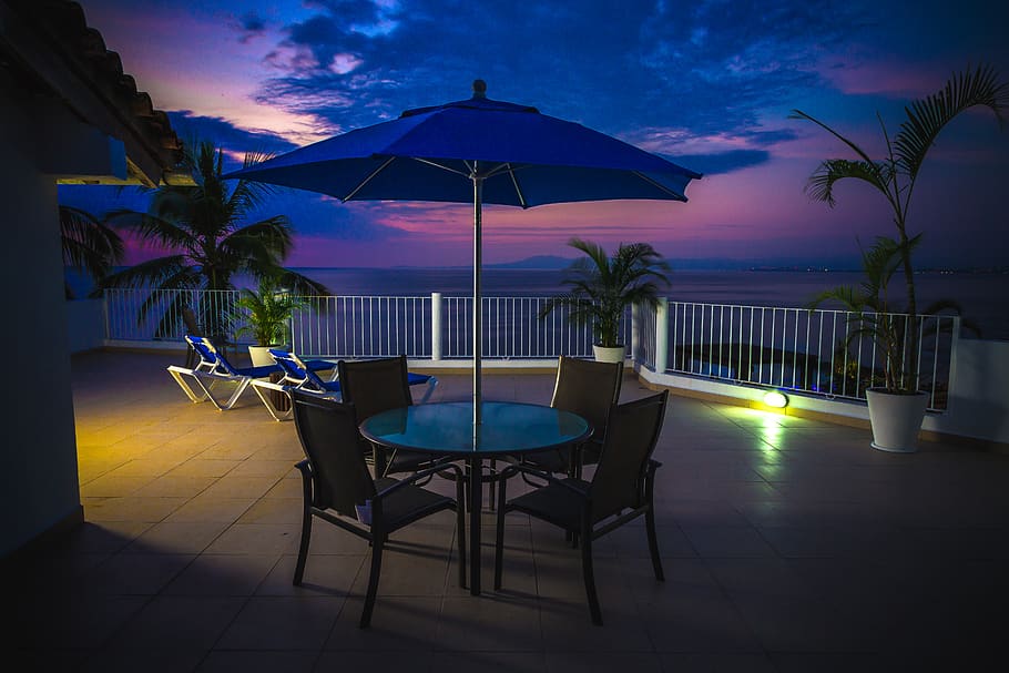 Round Metal Patio Near Railings at Night, balcony, chair, clouds HD wallpaper