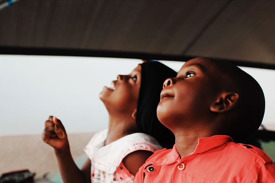 Two Children Looking Up, african children, boy, car, cheerful