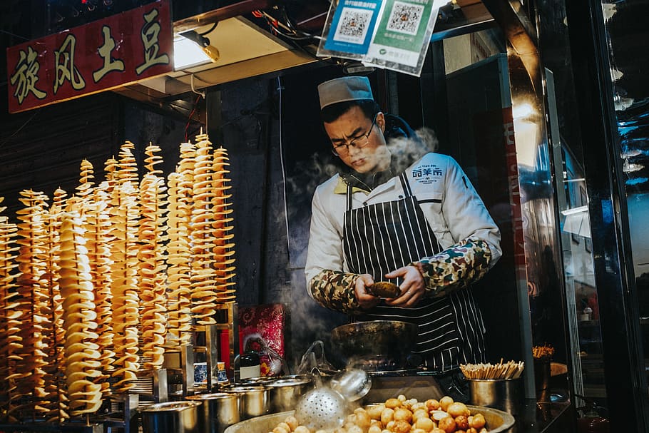man frying potato, food and drink, one person, real people, retail HD wallpaper