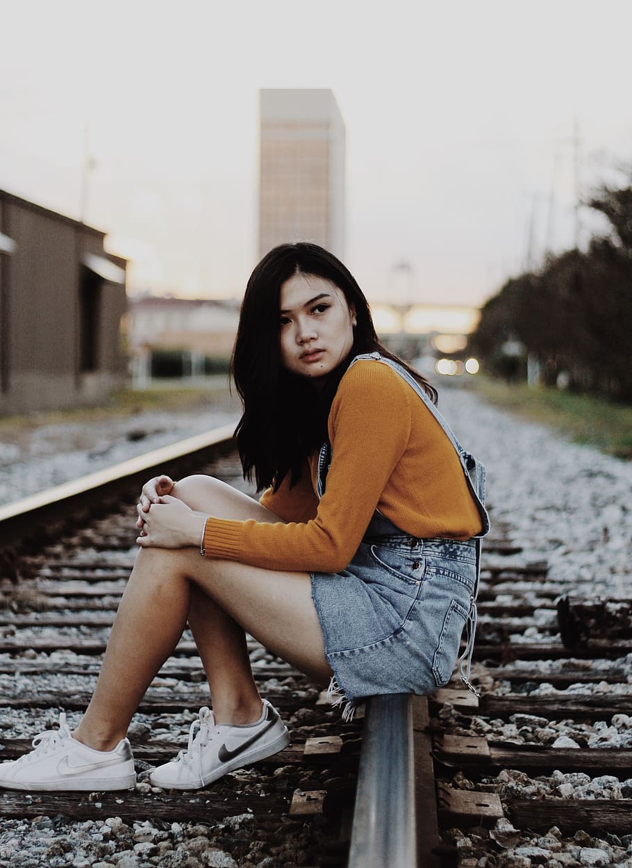 woman sitting on railway, transportation, train track, apparel, HD wallpaper