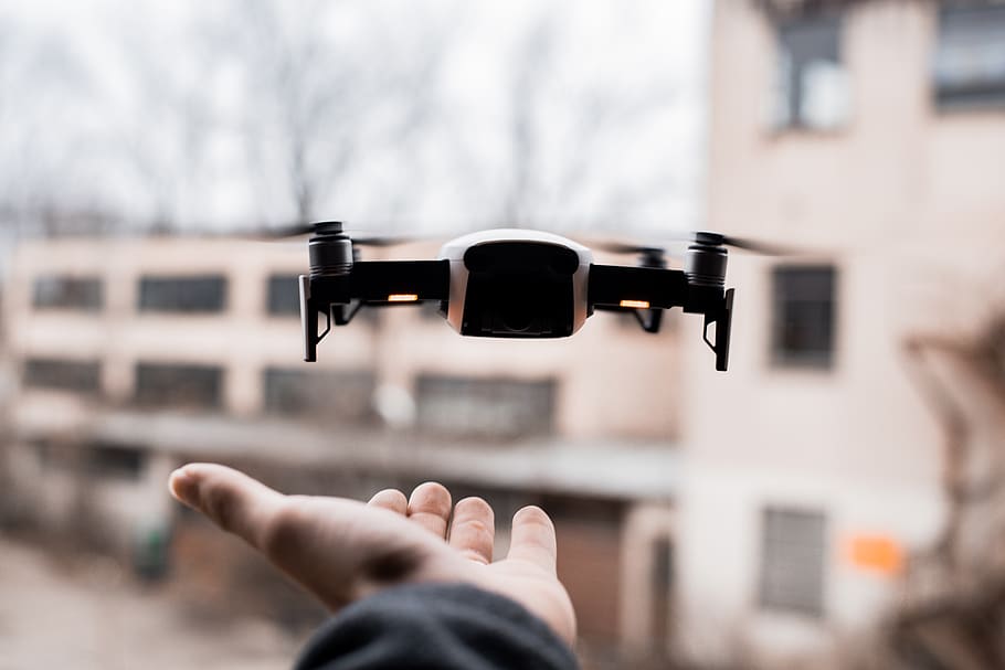 quadcopter during daytime, person, human, finger, hand, accessory HD wallpaper