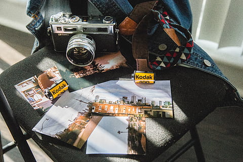 Camera On Black Folding Chair, analog camera, kodak, photos, pictures HD wallpaper