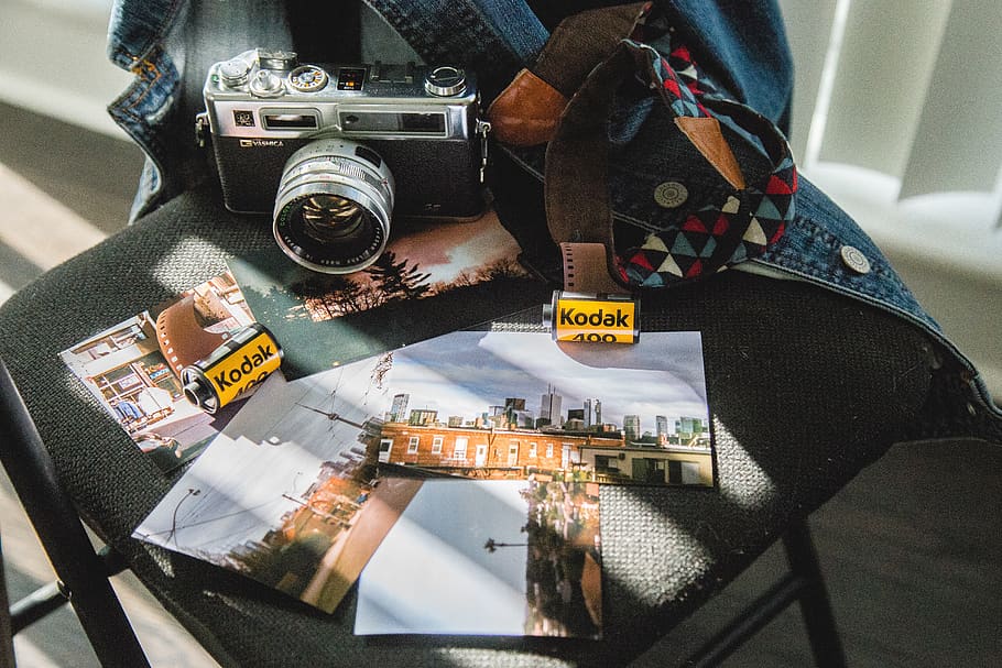 Camera On Black Folding Chair, analog camera, kodak, photos, pictures HD wallpaper