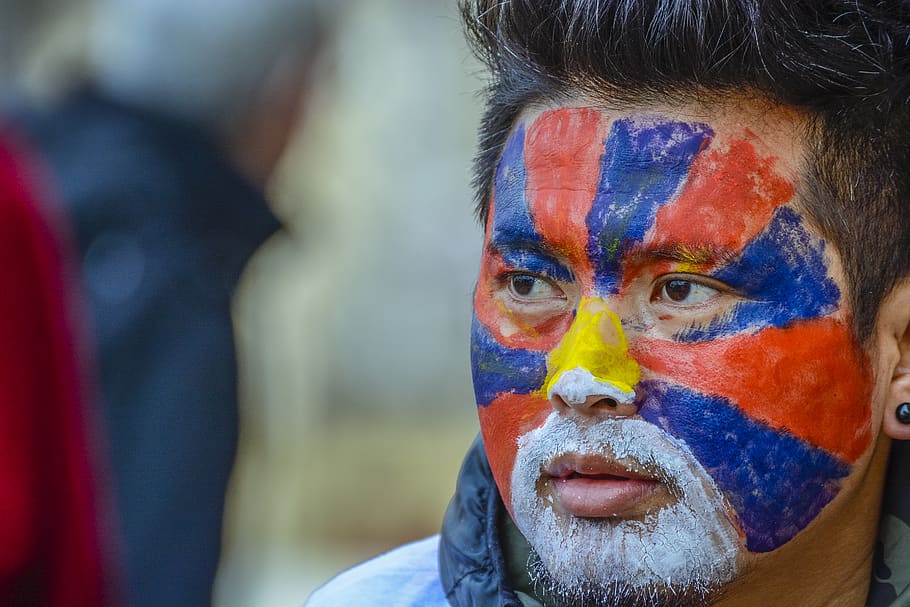 man with multicolored painting, face, human, person, france, paris