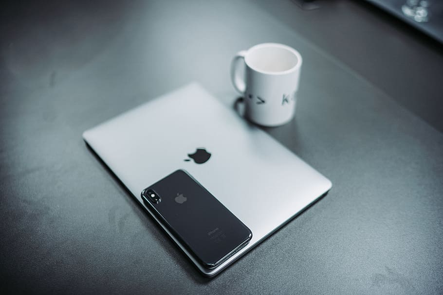MacBook and white mug, phone, electronics, cell phone, mobile phone HD wallpaper