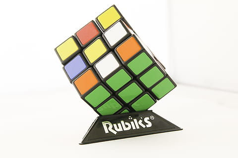 rubiks cube, puzzle, rubik's, western script, text, indoors HD wallpaper