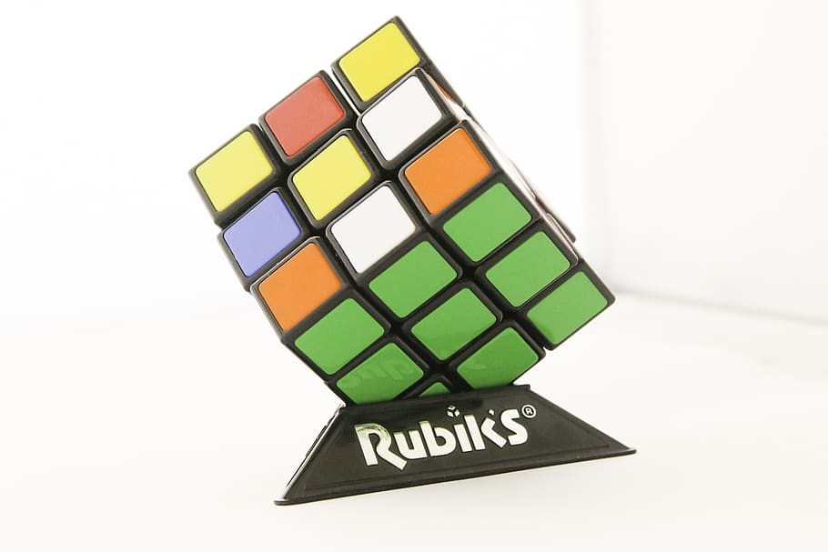 rubiks cube, puzzle, rubik's, western script, text, indoors HD wallpaper